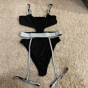 Black monokini with silver garter